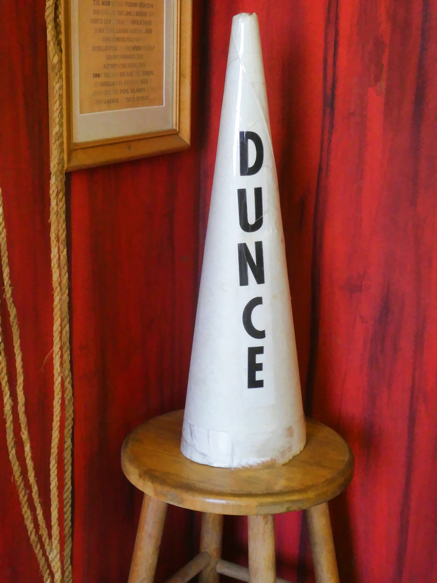 Dunce cap on stool